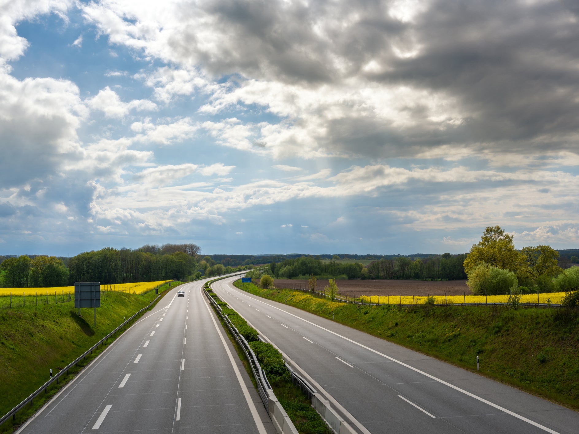 One car on an otherwise empty motorway during the coronavirus pandemic. Road-based transport was the biggest contributor to falls in CO2 during lockdowns