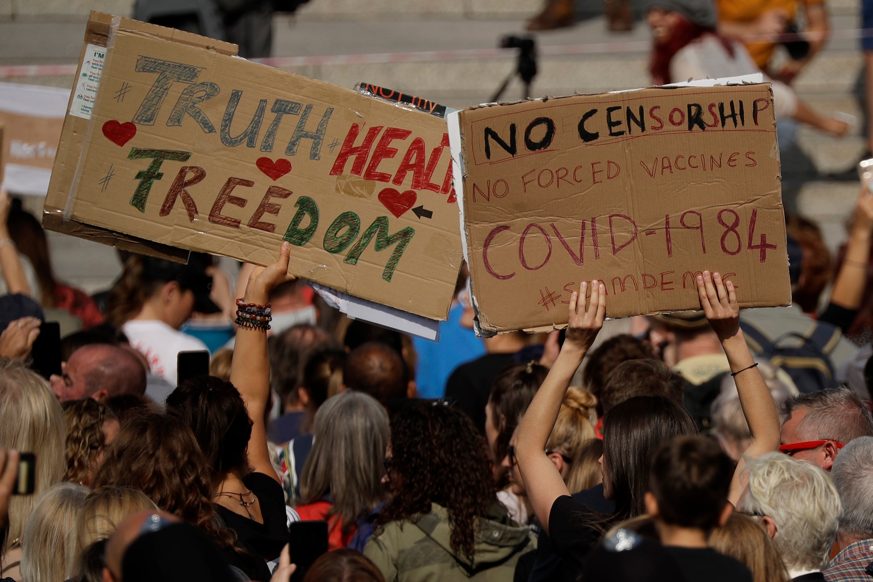 Thousands of people have attended rallies protesting against measures to stop the spread of coronavirus such as masks and vaccines