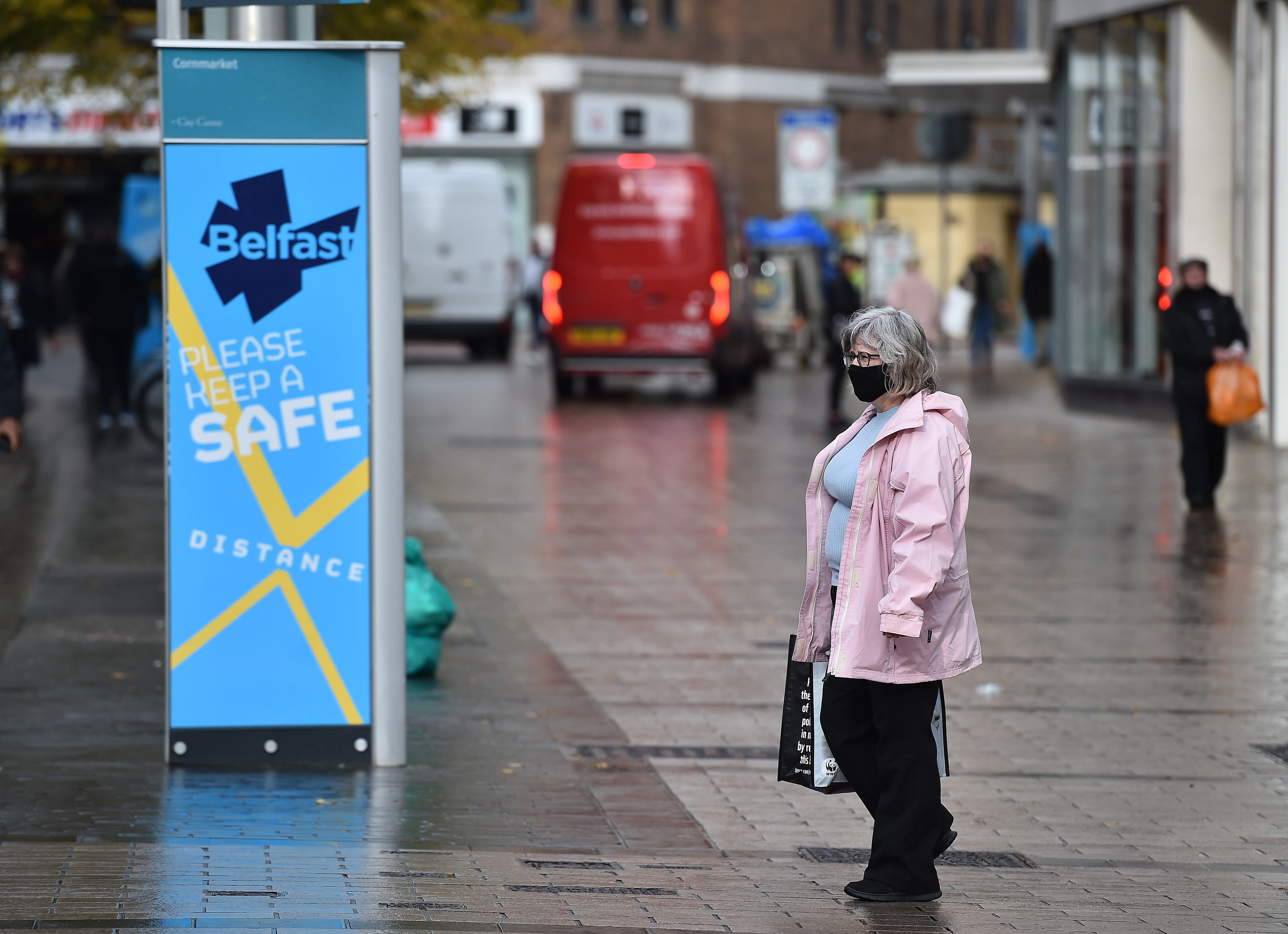 Shoppers in Belfast city centre wearing face masks