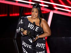 Lizzo wears custom ‘Vote’ dress to Billboard Music Awards