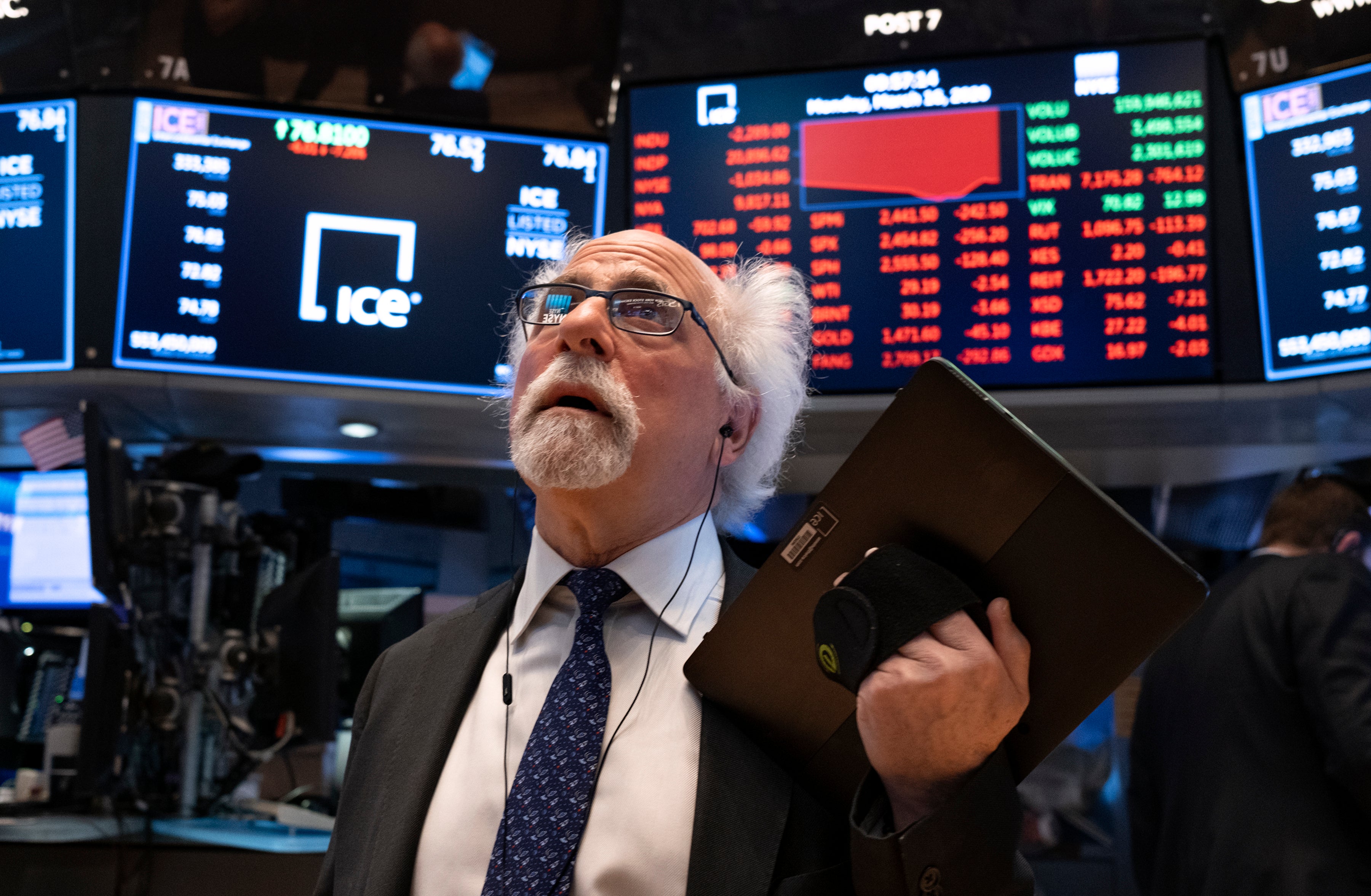 Traders work on the floor of the New York Stock Exchange (NYSE) in New York City