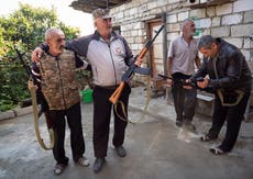 Nagorno-Karabakh volunteers get weapons as clashes intensify