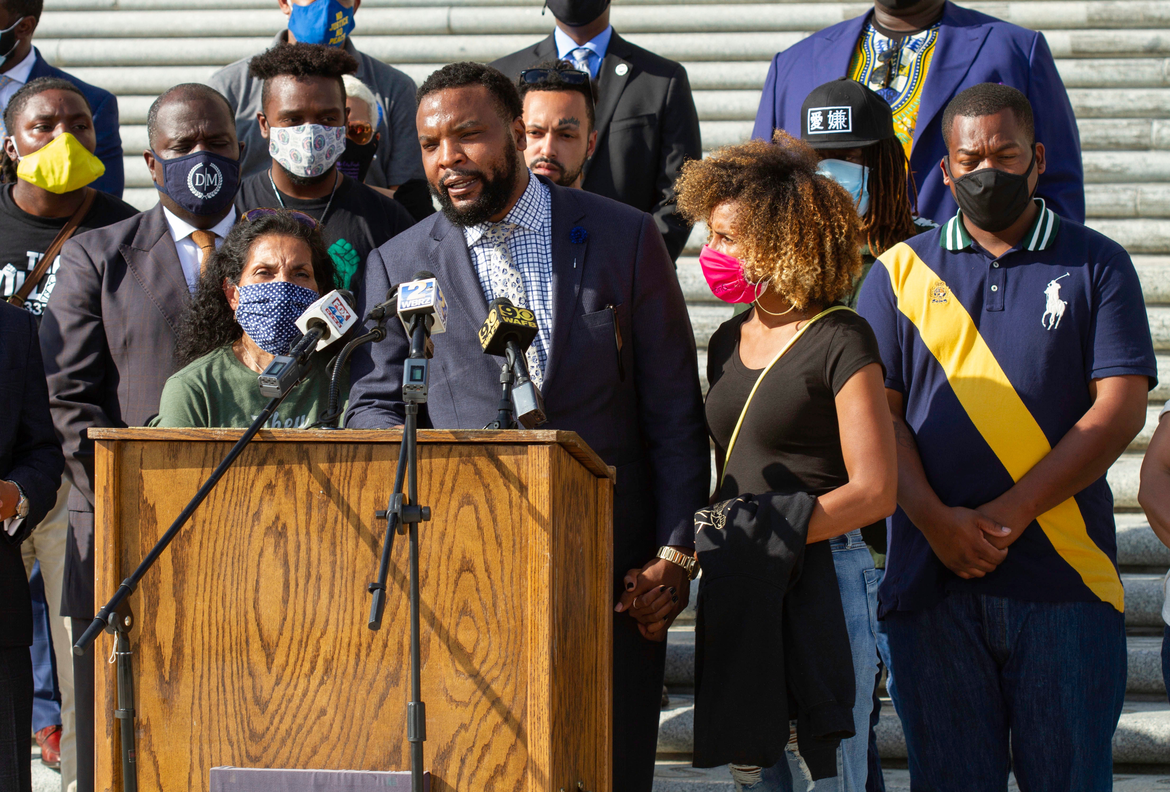 Attorney Lee Merritt speaks at a news conference along with the family of Ronald Greene and others outside the Louisiana State Capitol in Baton Rouge