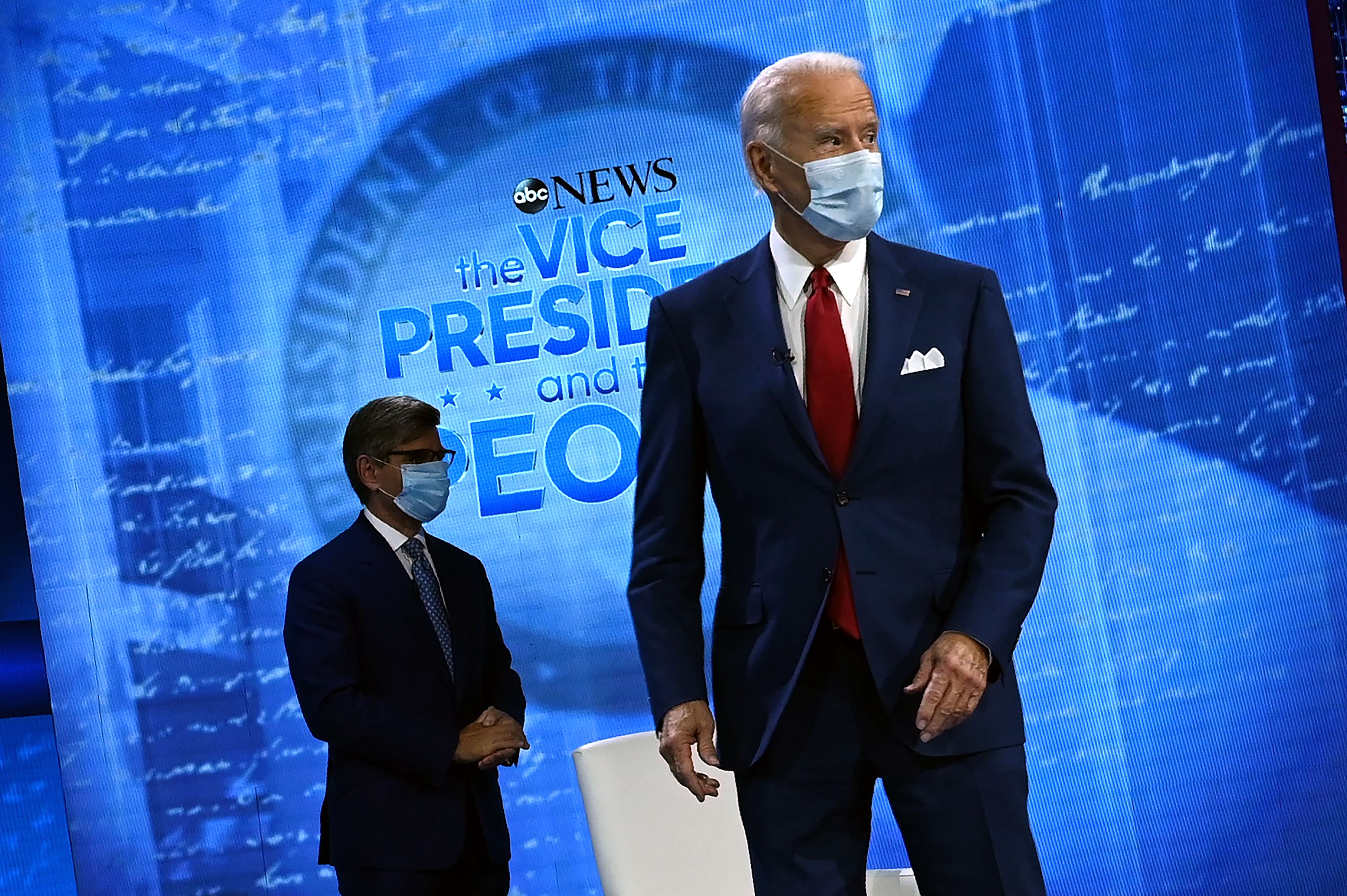 Democratic Presidential candidate and former US Vice President Joe Biden (L) and moderator George Stephanopoulos arrive for an ABC News town hall event at the National Constitution Center in Philadelphia on October 15, 2020. (Photo by JIM WATSON/AFP via Getty Images)