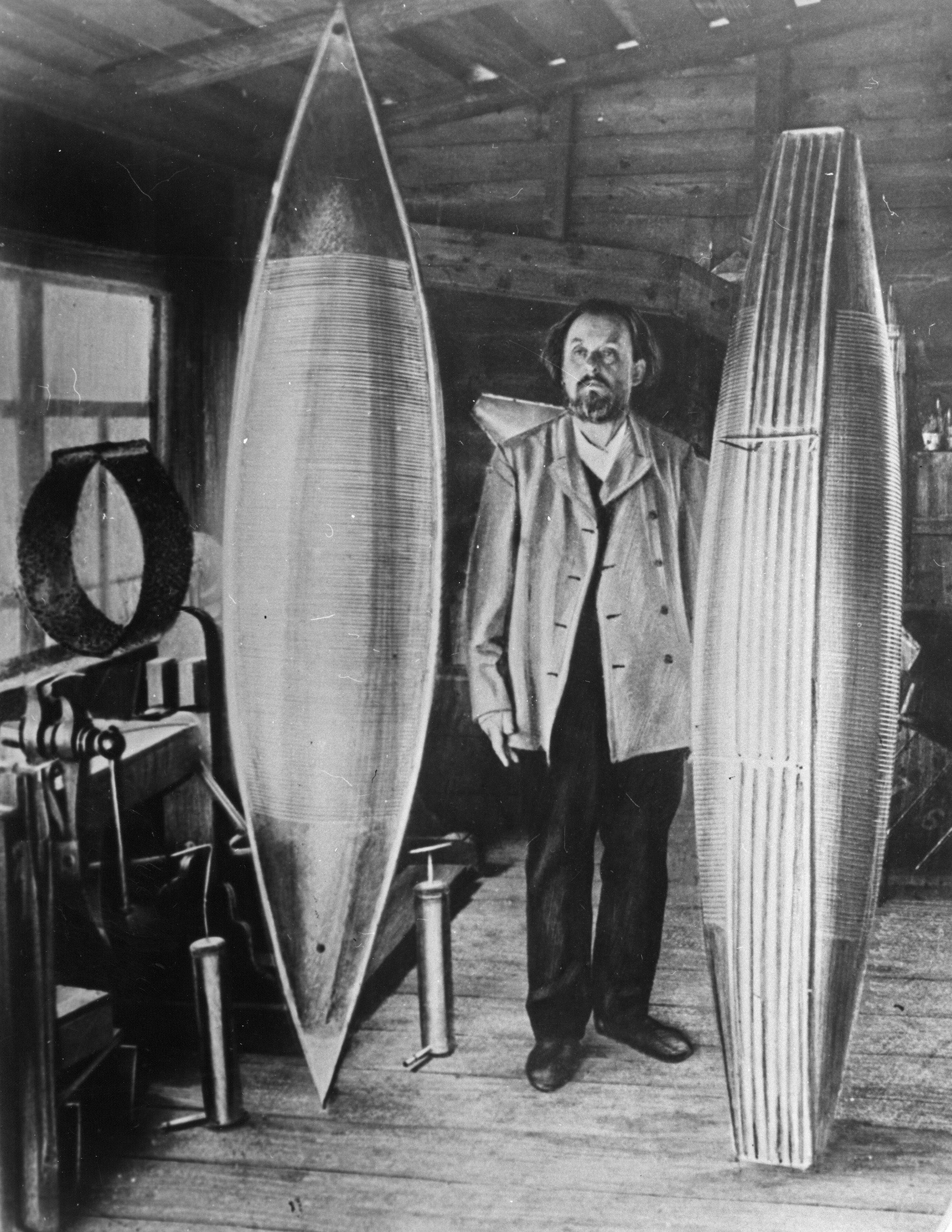 Konstantin tsiolkovsky, pioneer scientist in the field of rockets and space travel, with his all-metal airship models in his workshop in Kaluga in 2013