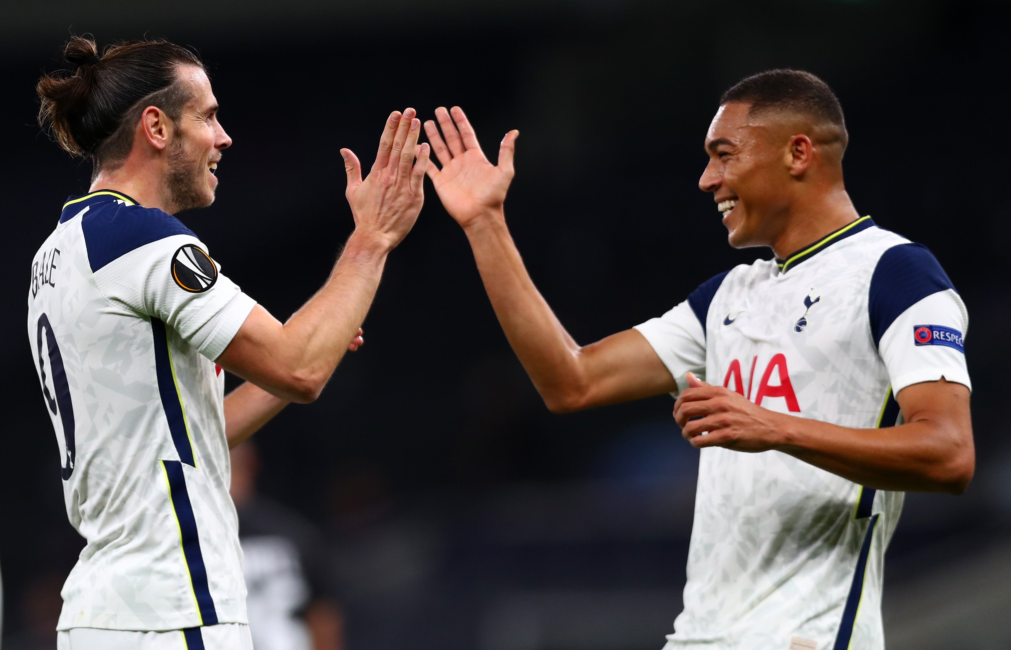 Gareth Bale celebrates with team mate Carlos Vinicius