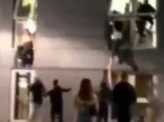 Students filmed jumping out of windows when security break up party