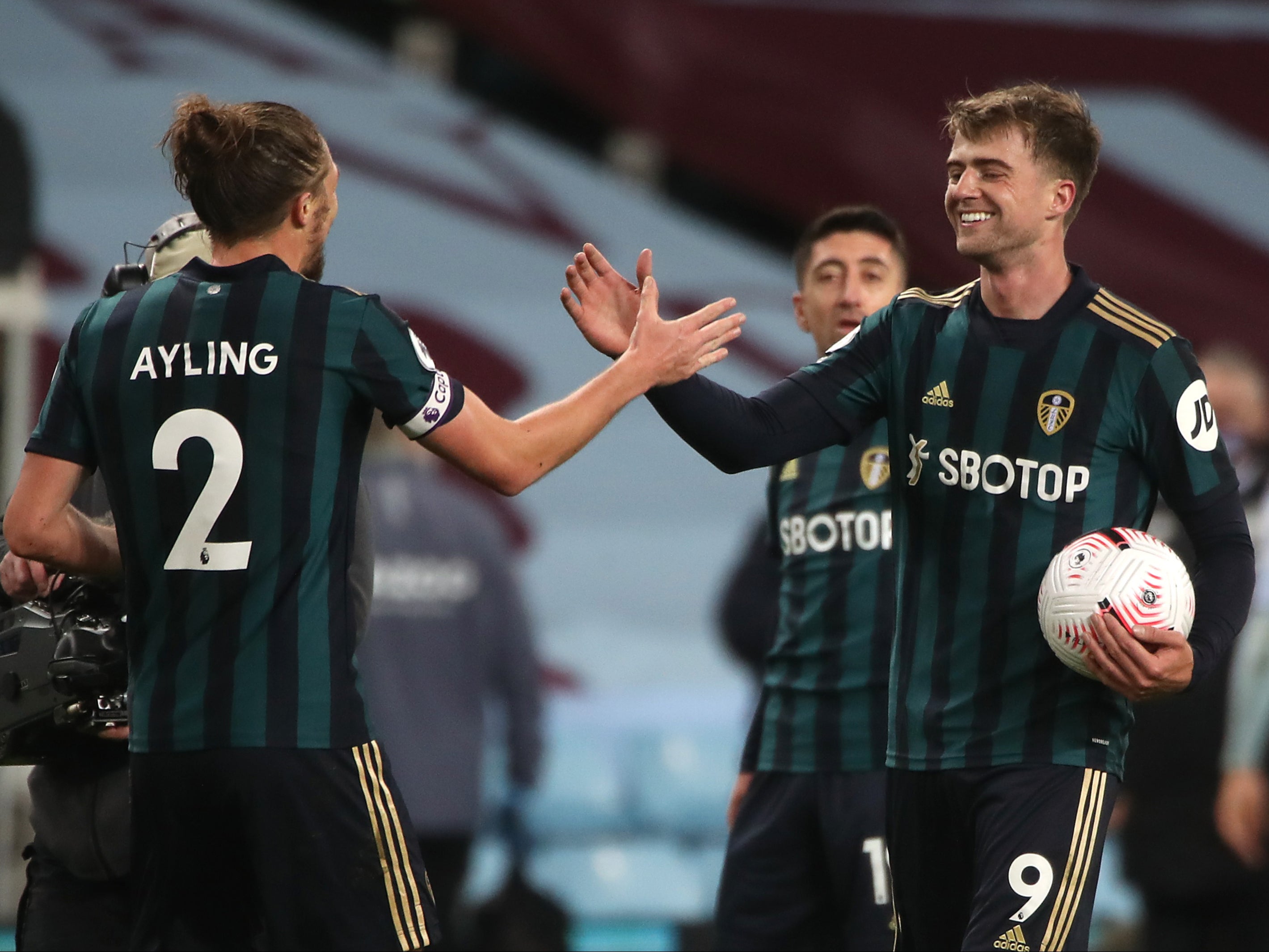 Patrick Bamford celebrates with the matchball