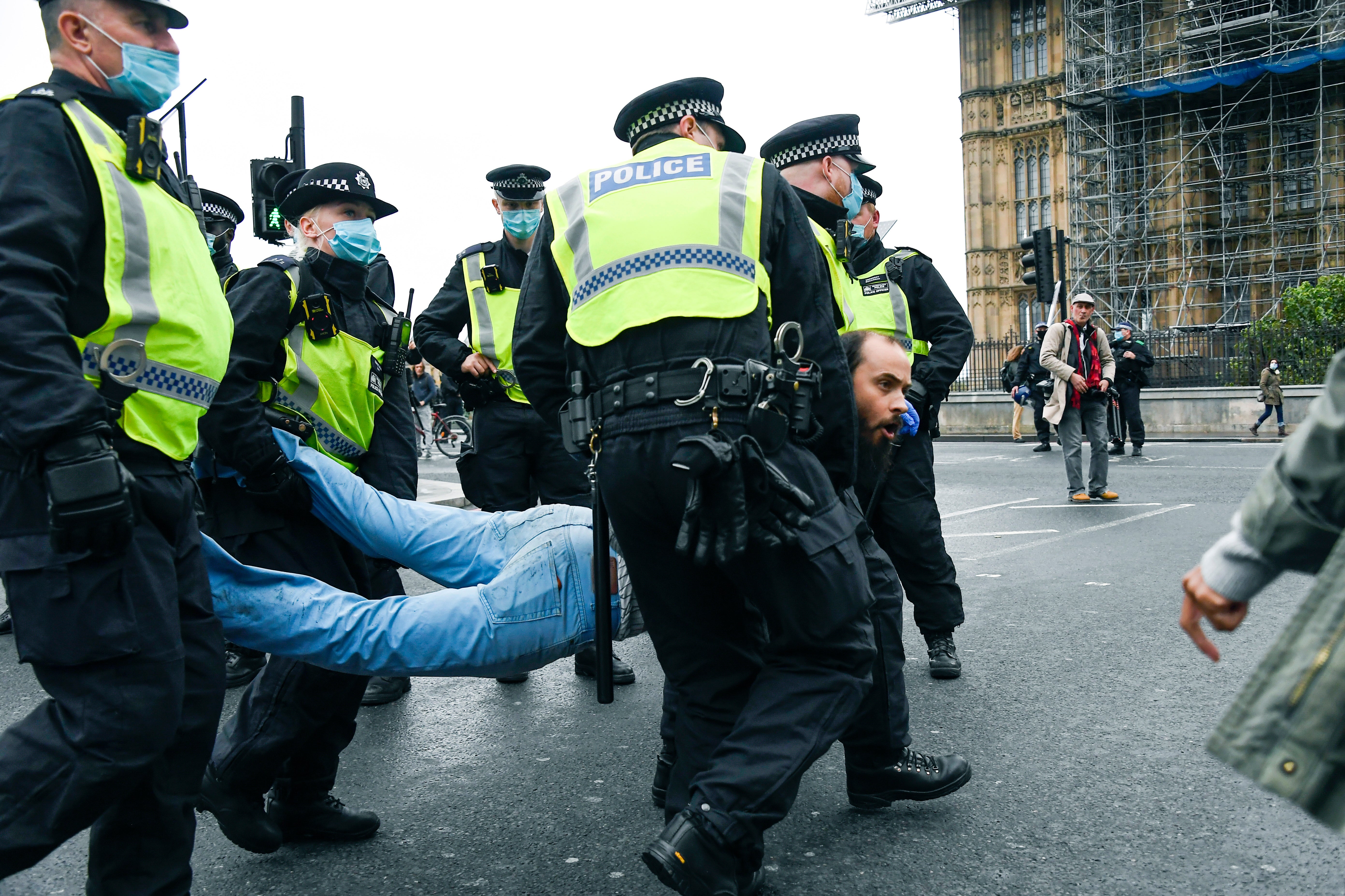 APTOPIX Virus Outbreak Britain Protest