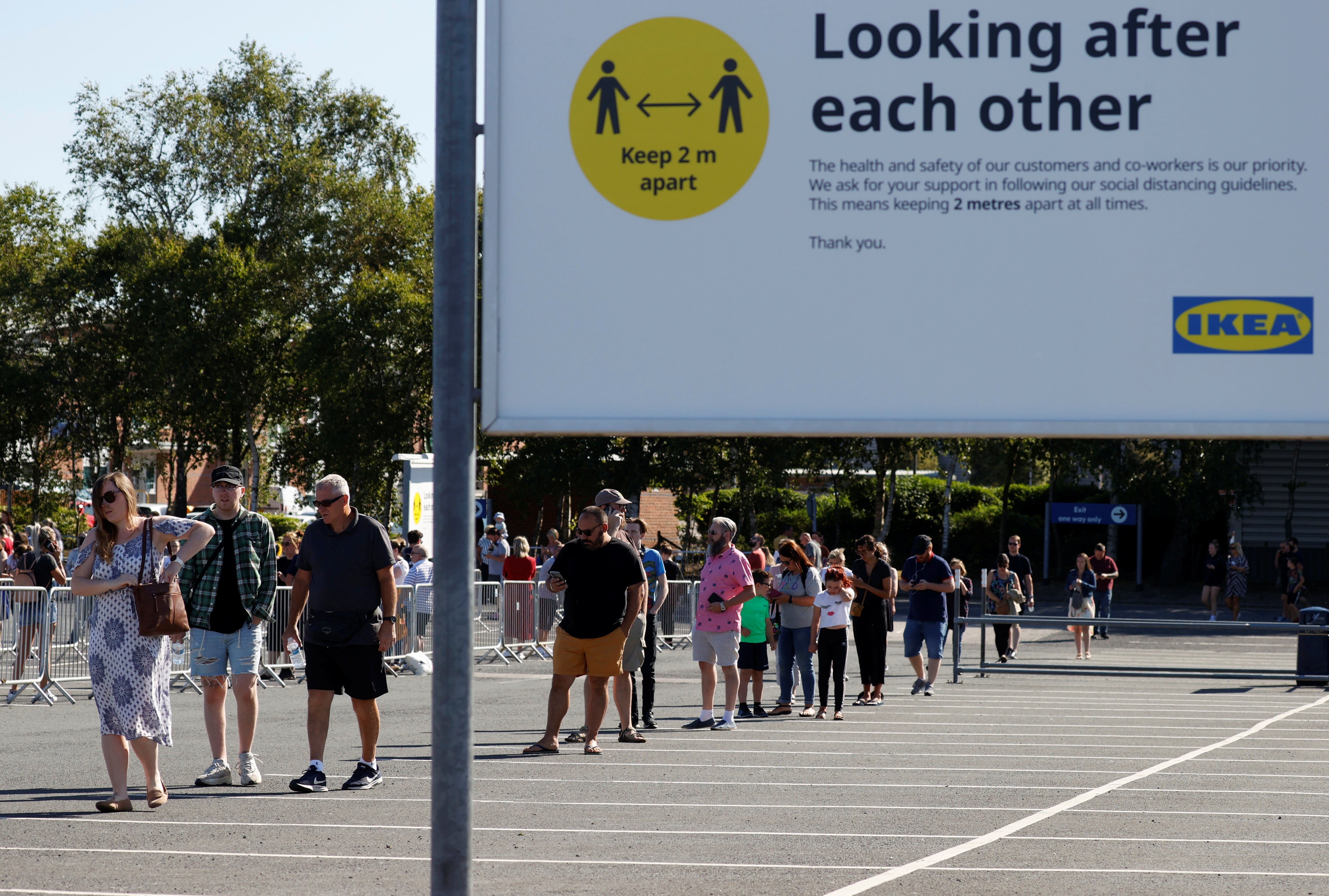 Shoppers in Warrington observe social distancing rules