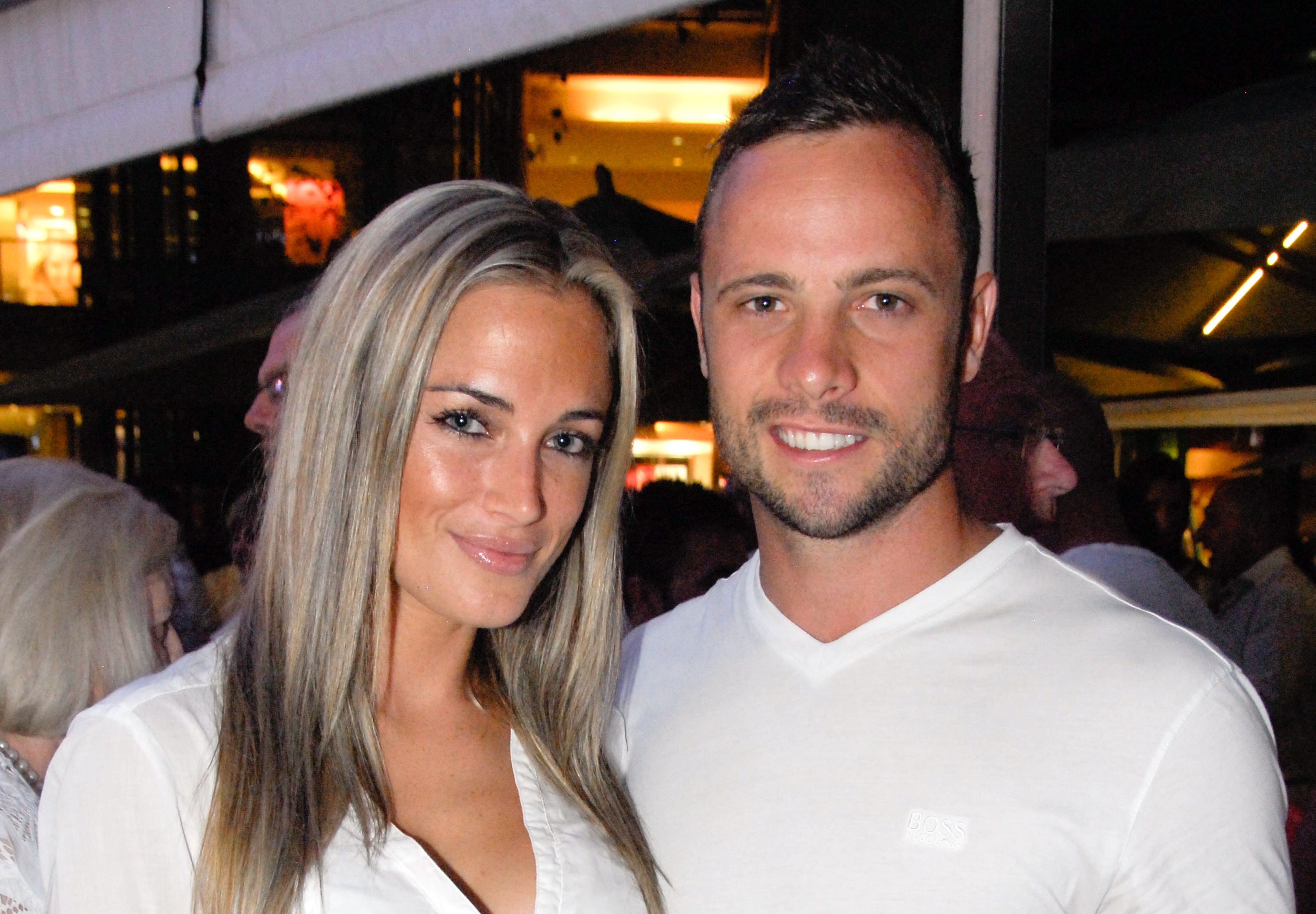 Reeva Steenkamp (left) with Pistorius less than a month before her death