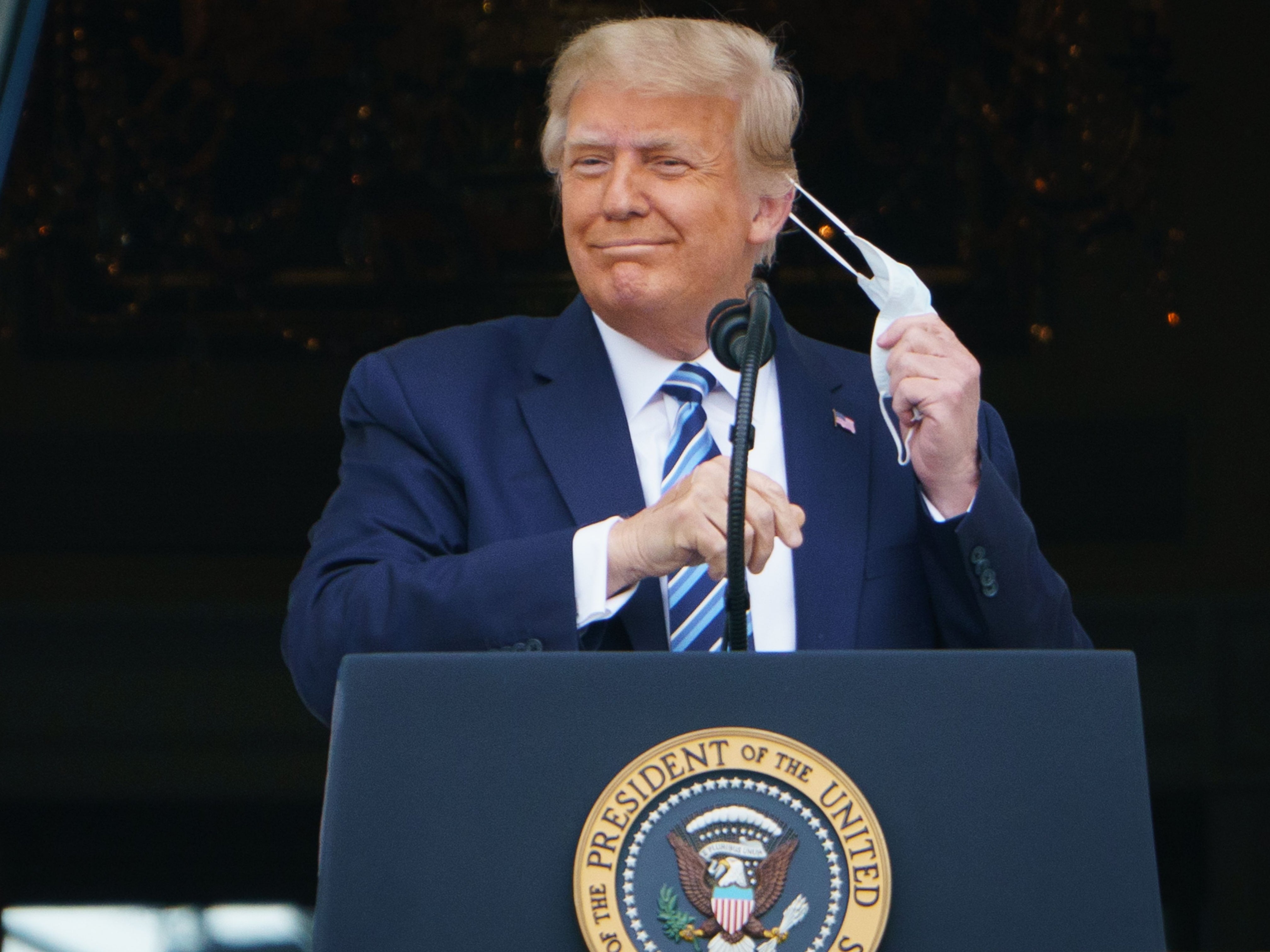 US towns discard face masks despite soaring cases