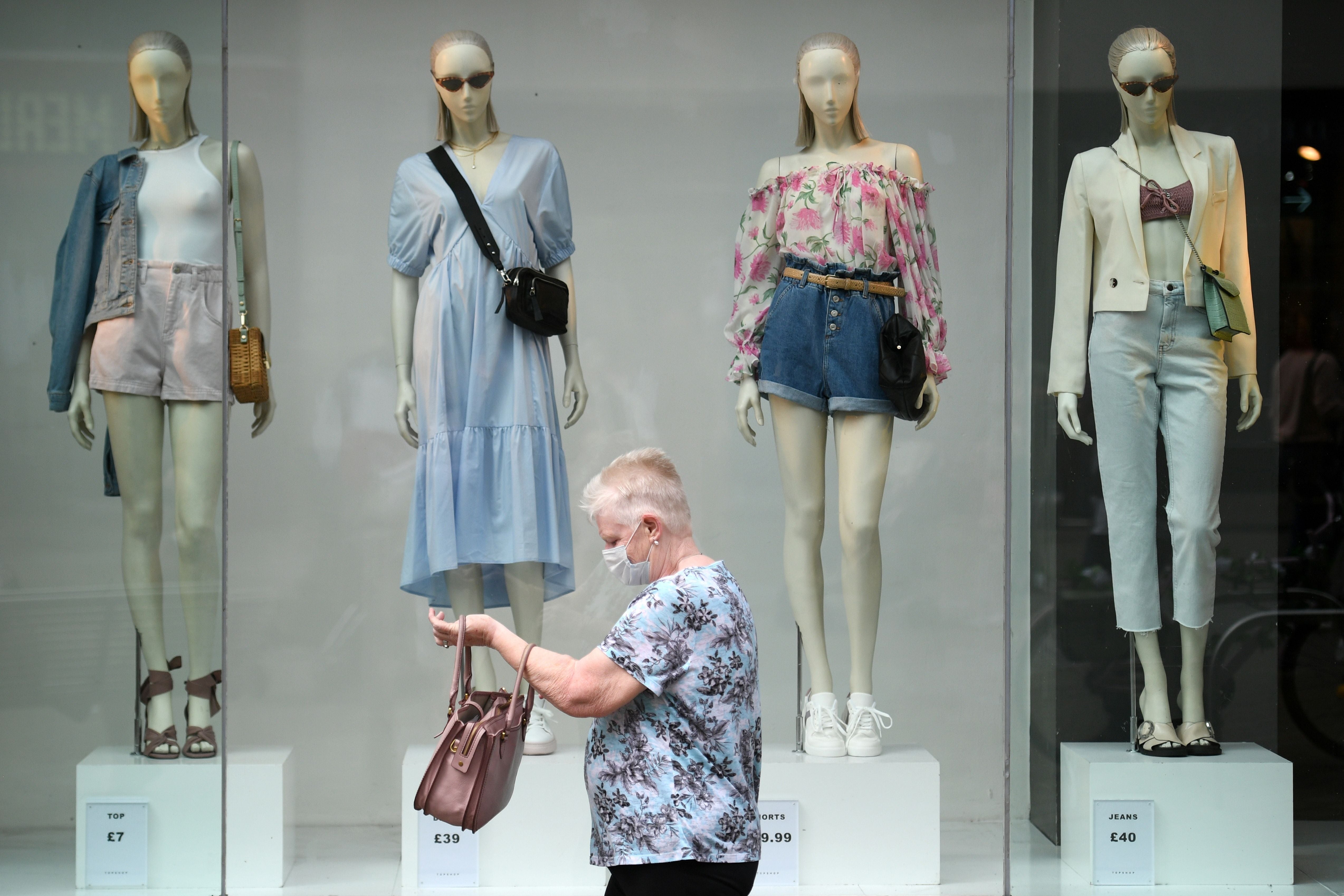 A shopper wears a facemask in the city centre of Leeds