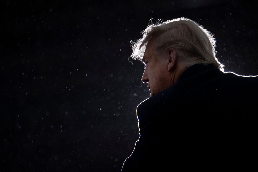 Donald Trump speaks during a rally at Capital Region International Airport