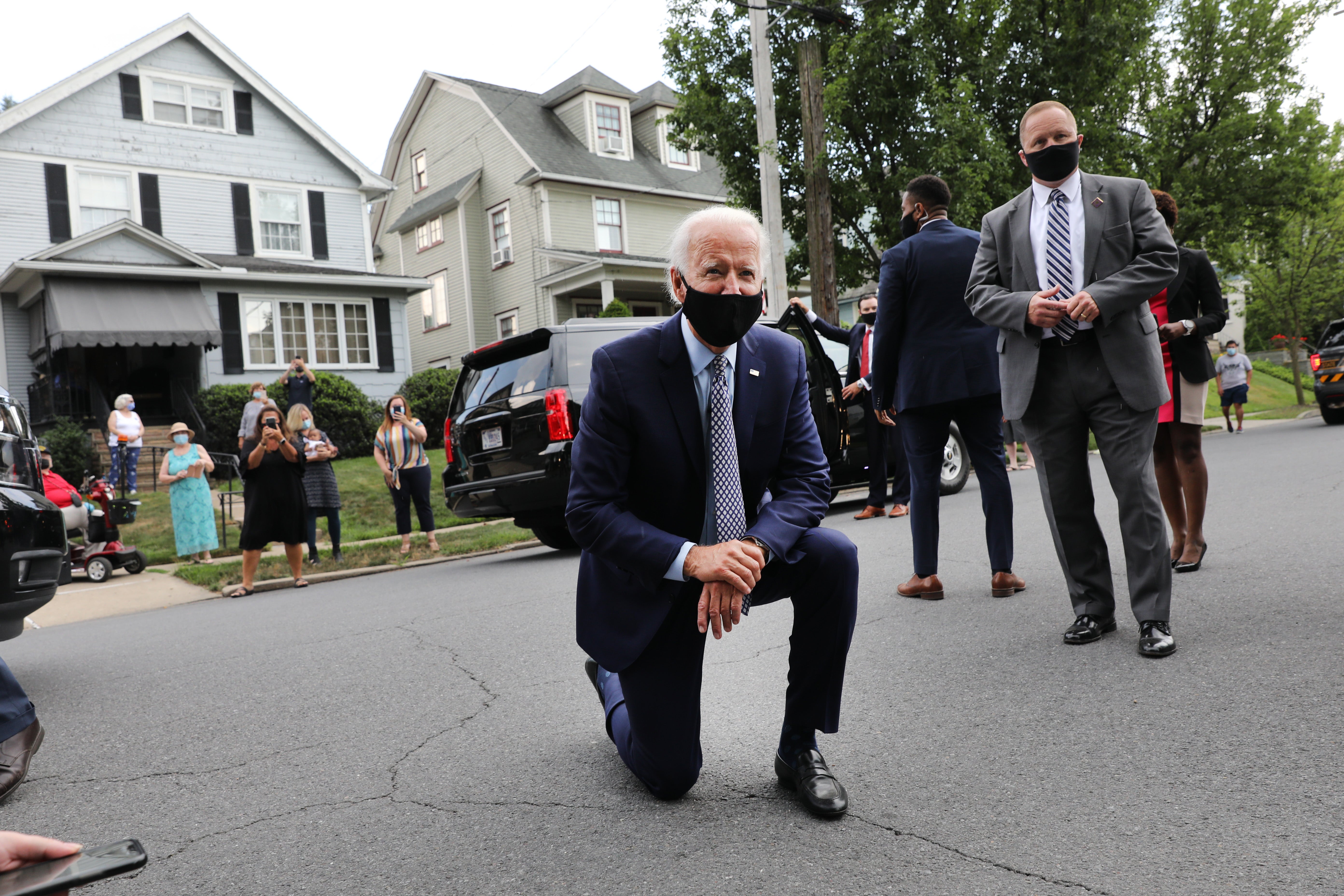 Joe Biden (pictured visiting his childhood home back in July) will aim to win the presidency today