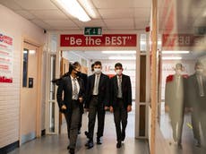 Face masks to be worn in secondary school corridors in England