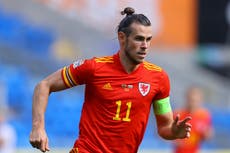 Bale returns for Wales in squad selected by absent coach Giggs