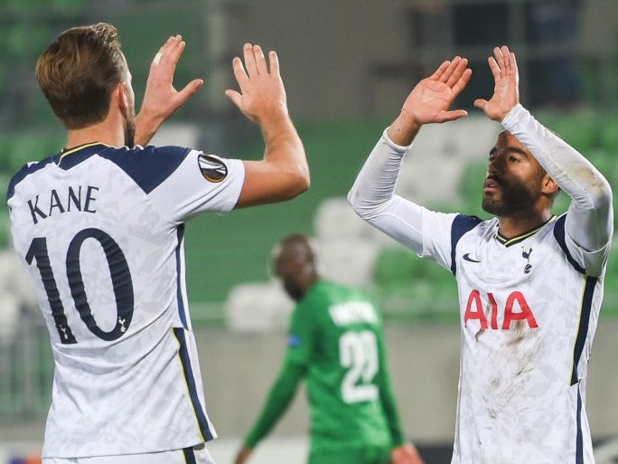 Lucas Moura celebrates with Harry Kane