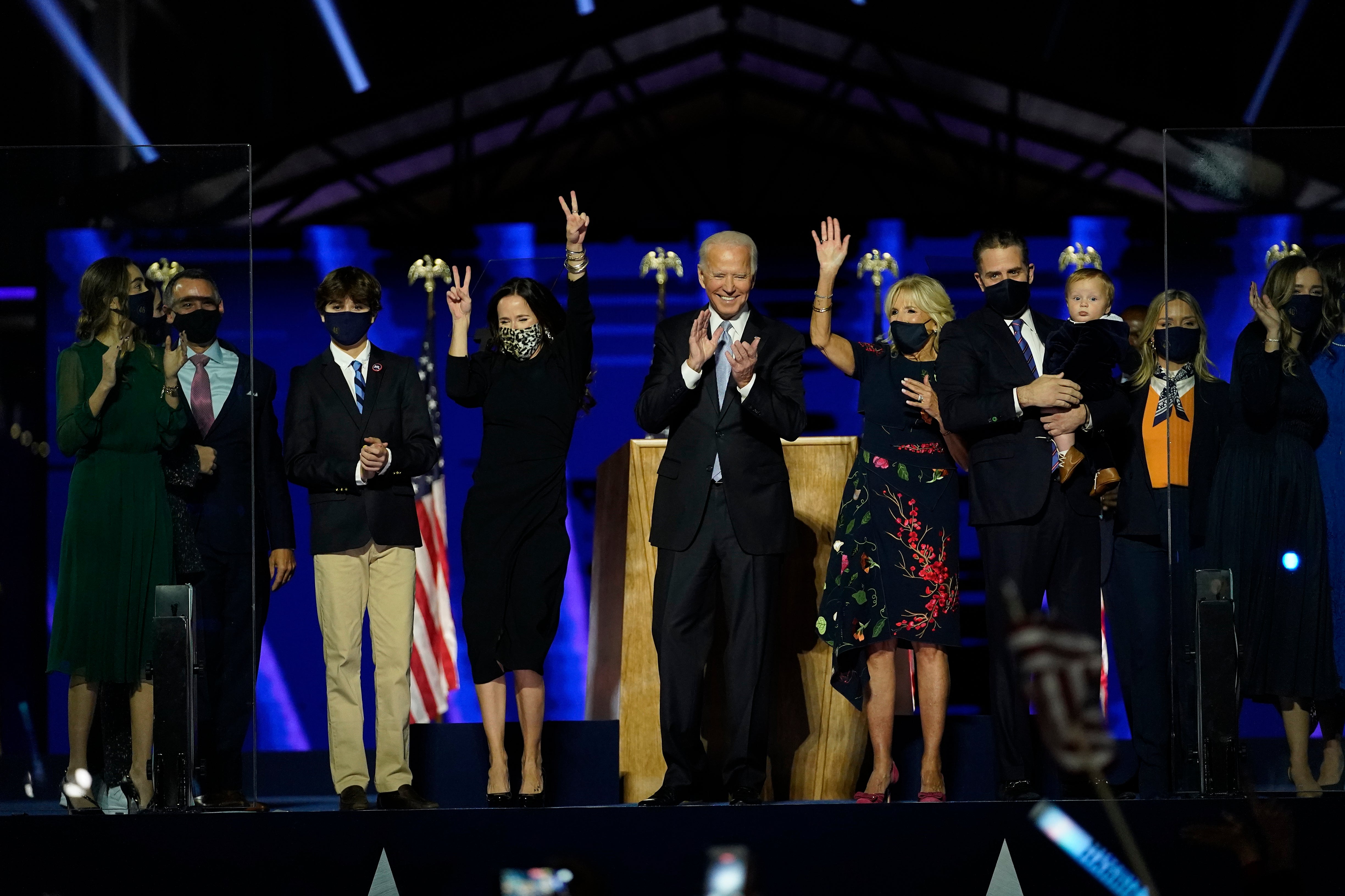 President-elect Joe Biden is joined on stage with his wife, Dr Jill Biden, children, and grandchildren after giving victory speech