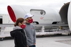 First passengers travel in a hyperloop pod through vacuum tube