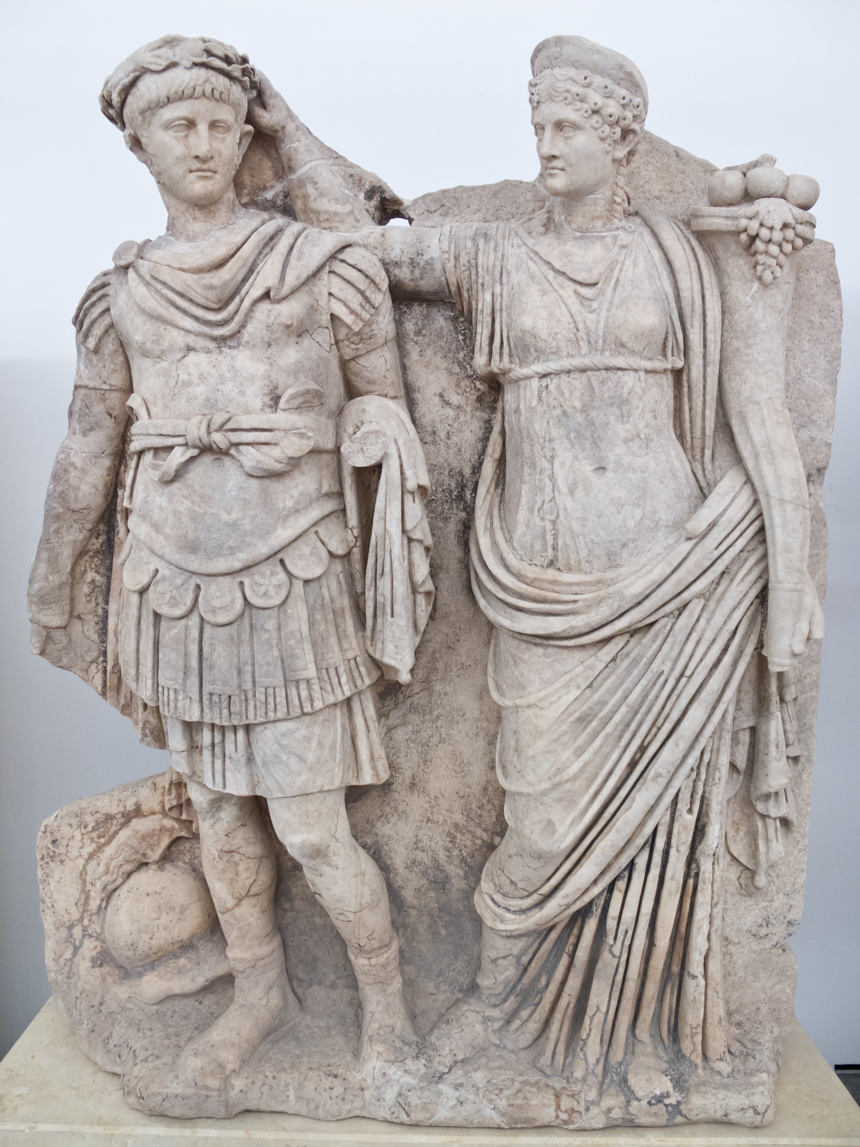 Teenage power: In this Roman sculpture, Nero's mother is seen crowning her 15-year-old son Emperor. Just five years later, obsessed with power, the emperor she had created murdered her.