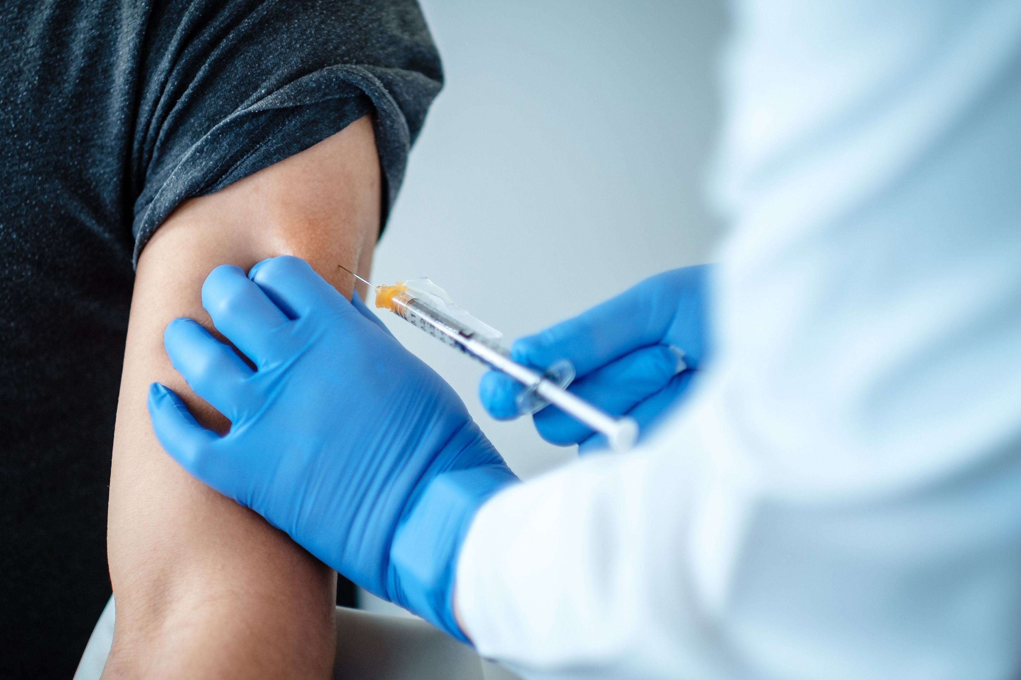 A patient being given a dose of a coronavirus vaccine produced by BioNTech