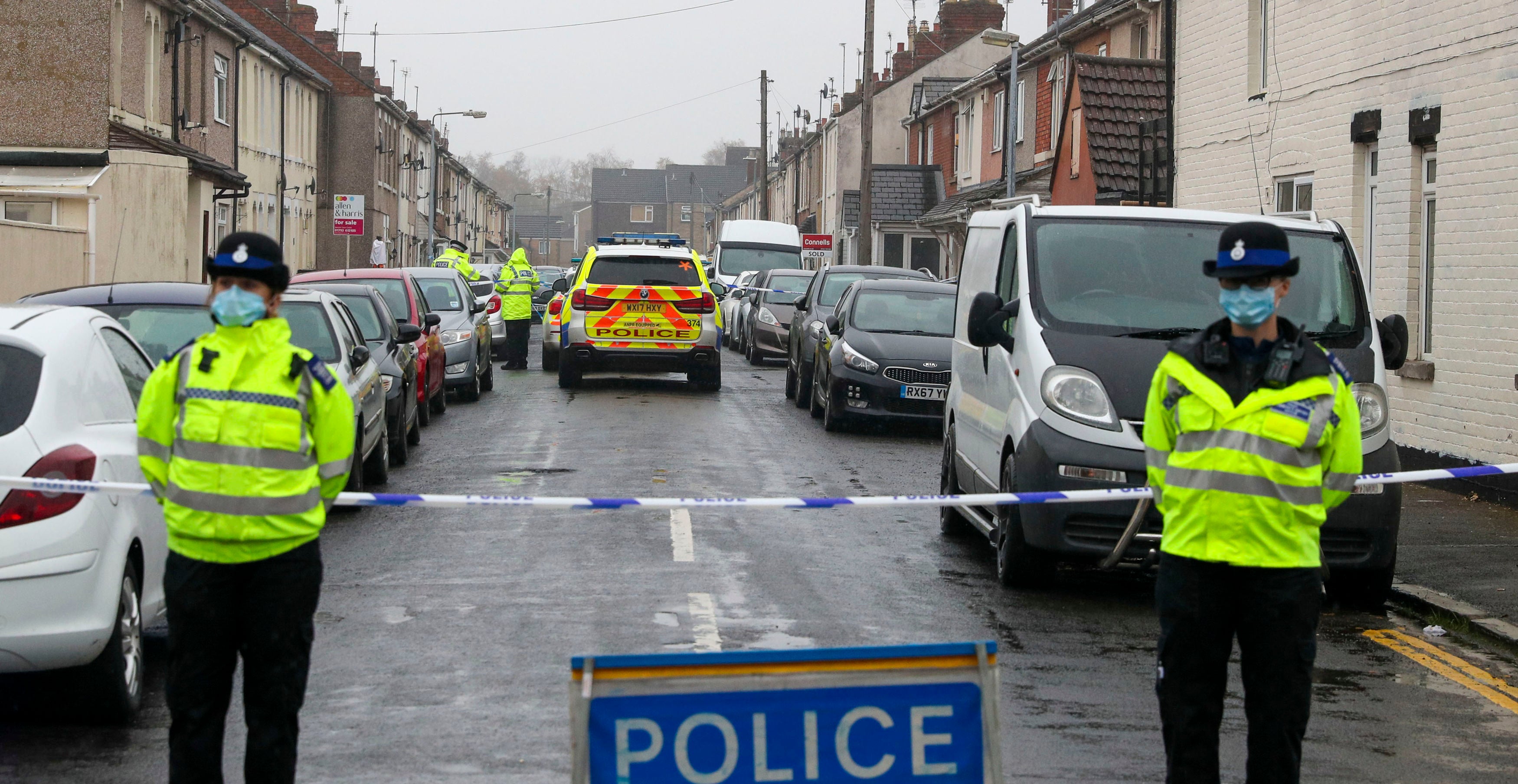 Police at the scene of the shooting in Summers Street, Swindon