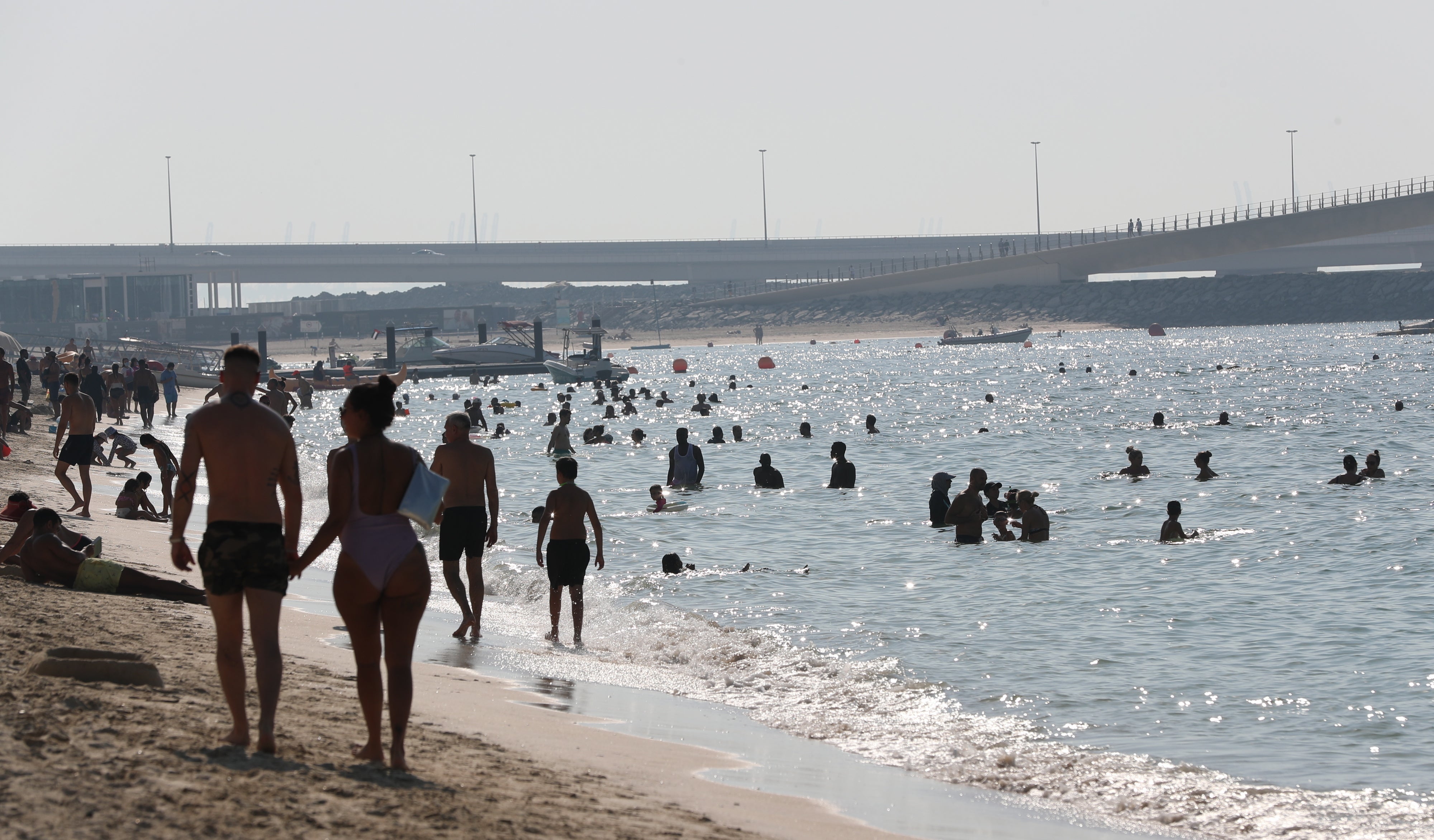 Beachgoers in Dubai