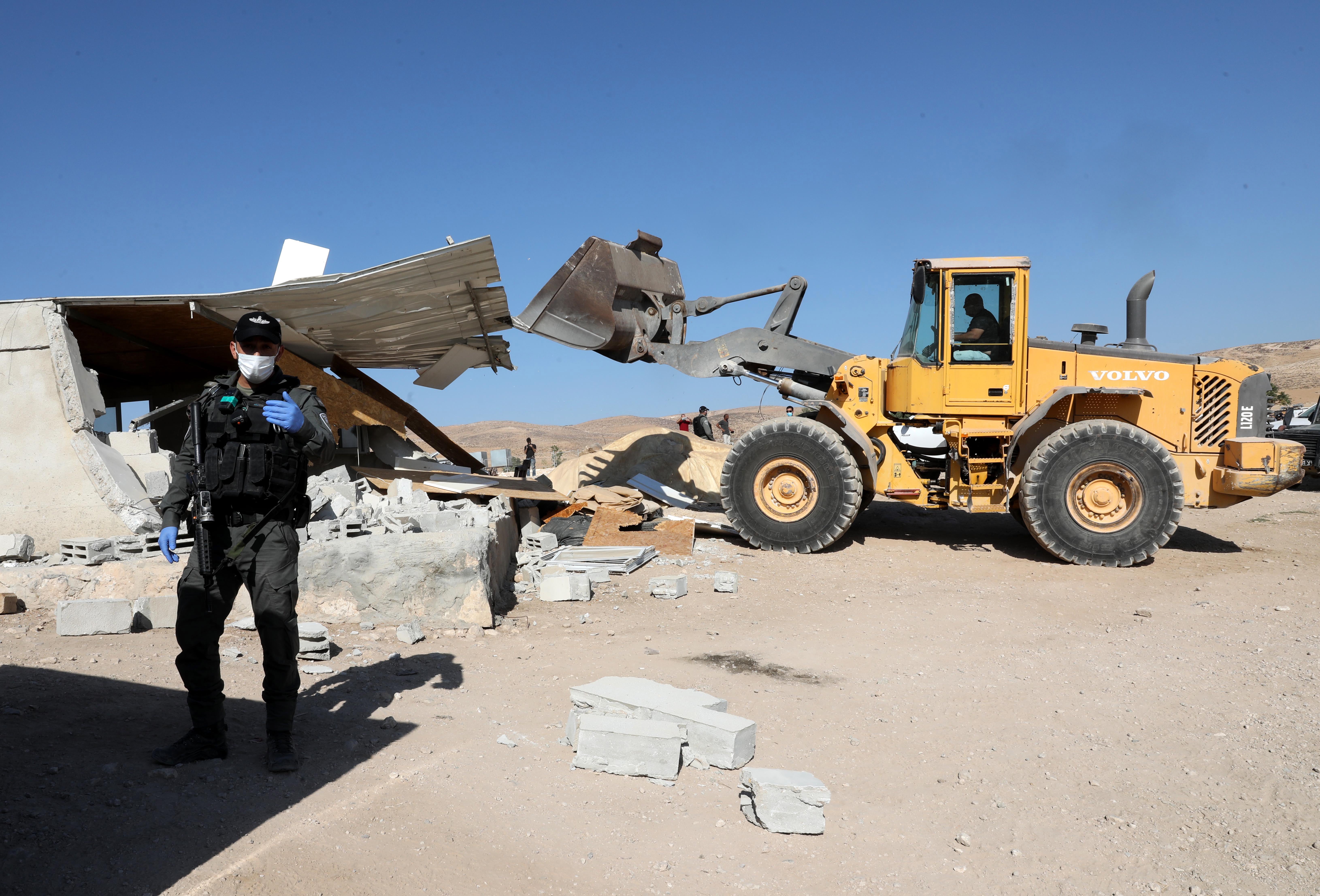 Palestinian workers after crossing into Israel from the West Bank in 2010