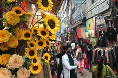 Asia Today: New Delhi cases spike again ahead of Diwali fest