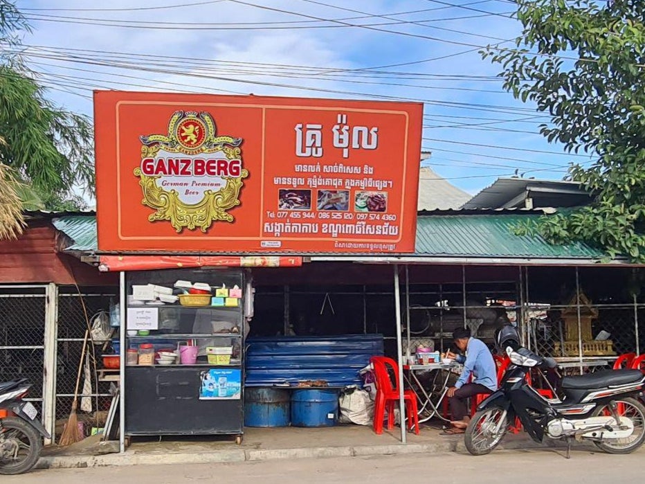 Street adverts for the beer suggest dog meat is the ideal accompaniment