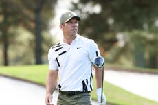 Casey surges into Masters lead as Woods lurks in chasing pack