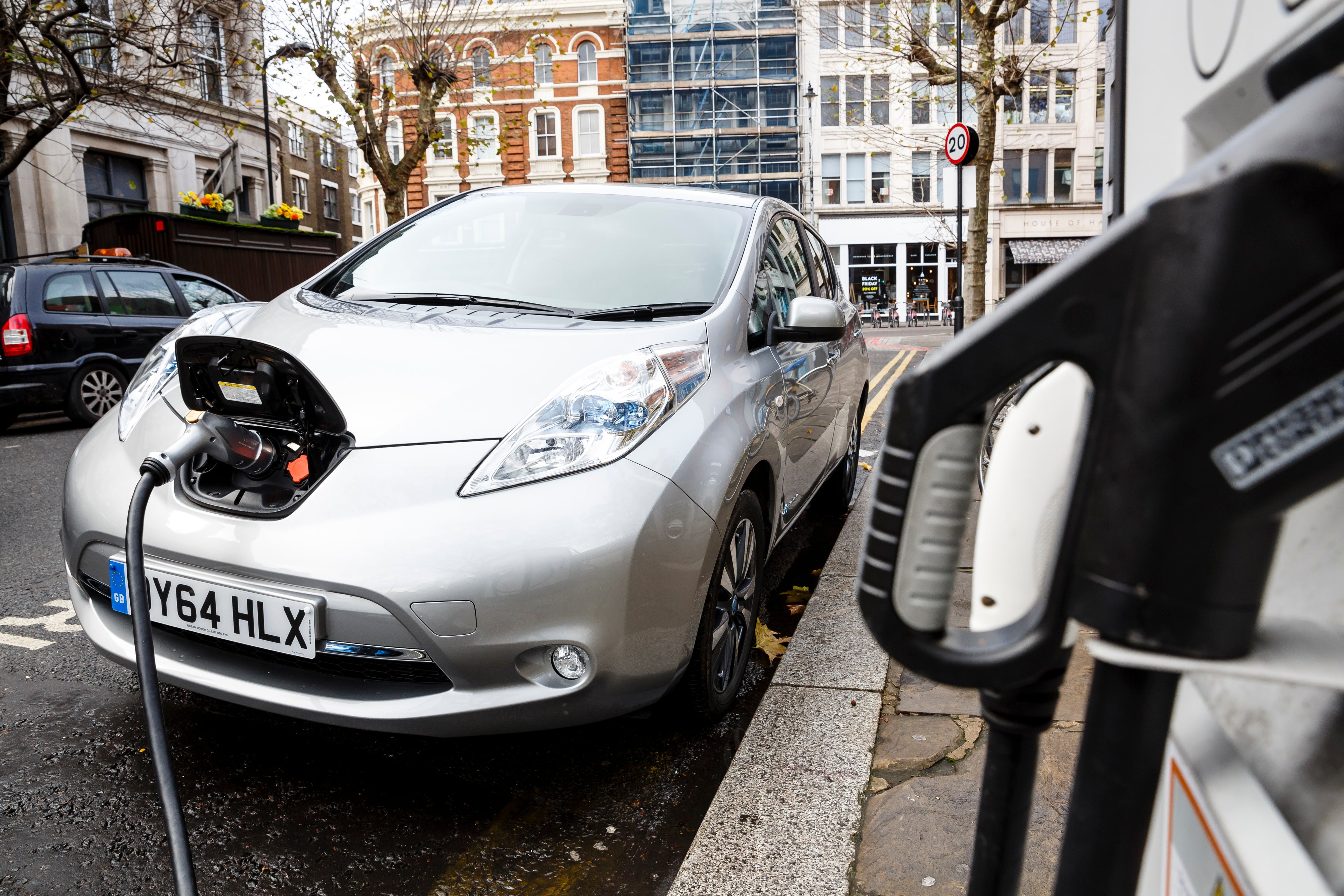 Go Ultra Low Nissan LEAF on charge on a London street