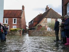 Flood warnings in Scotland as most Britons set for mild and cloudy day