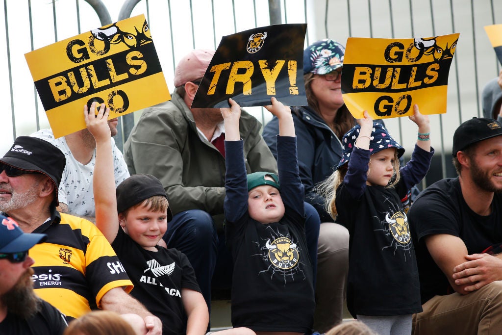 Young fans attend a rugby match in New Zealand earlier this month, a sign that life is gradually returning to normal in East Asian and Pacific nations