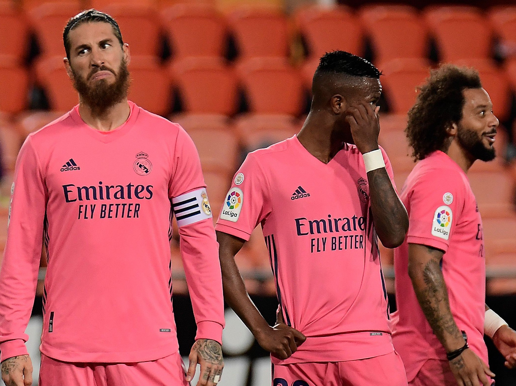 Real Madrid players react to their 4-1 defeat by Valencia