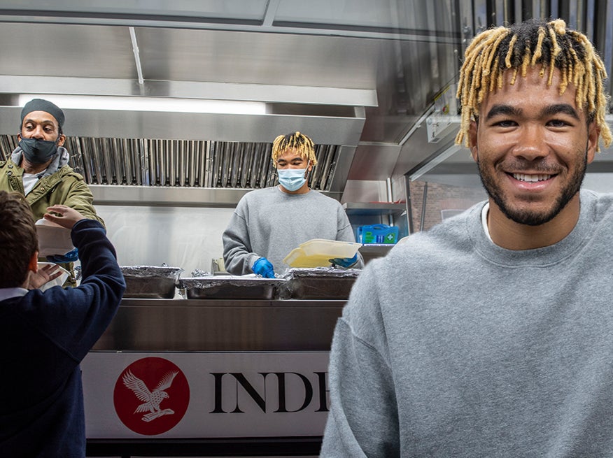 Reece James helps distribute hot meals in Marylebone.