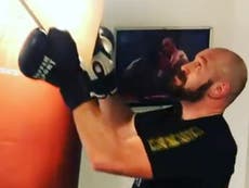 Fury smashes heavy bag until ceiling collapses