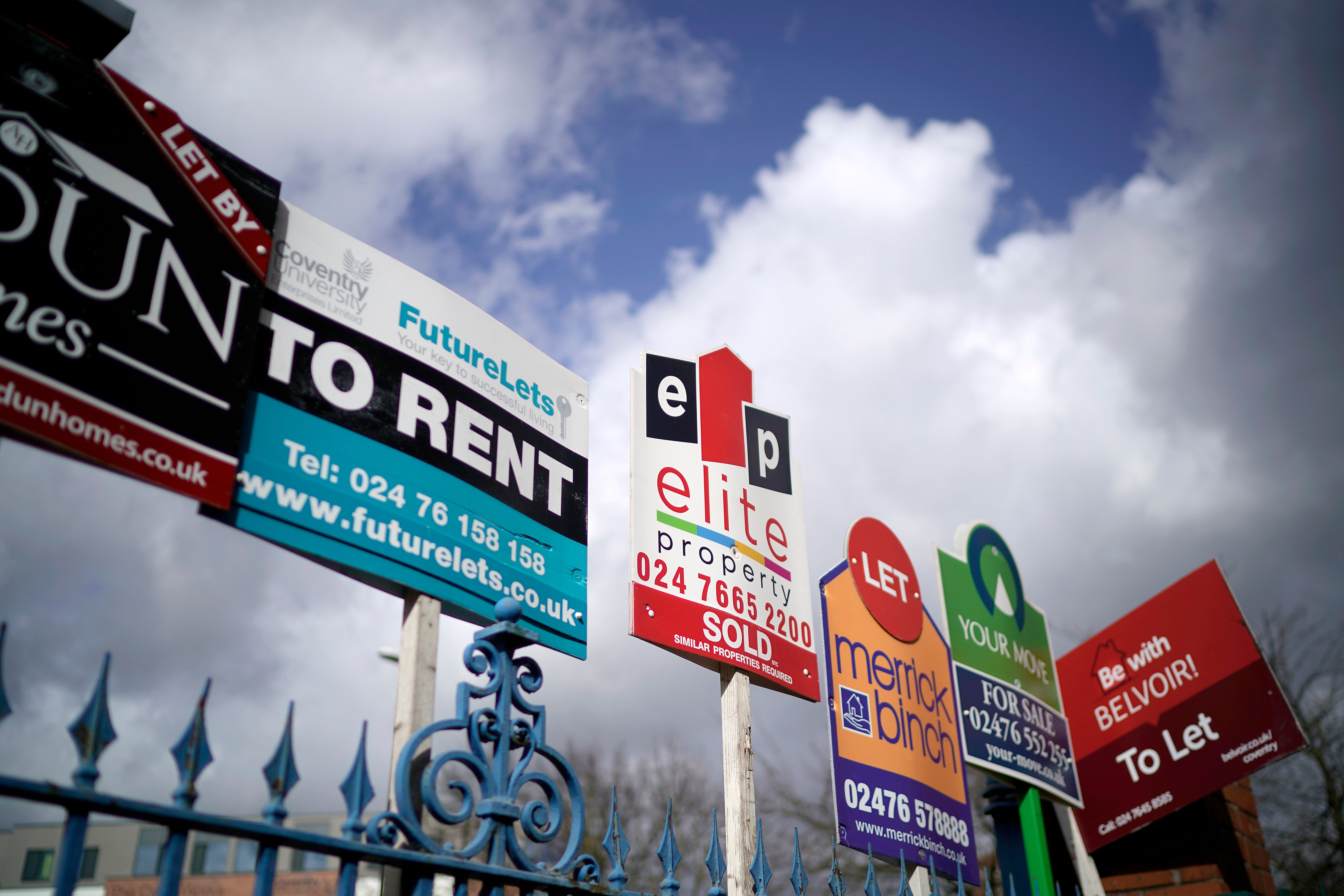 Estate agent "For Sale" and "To Let" signs