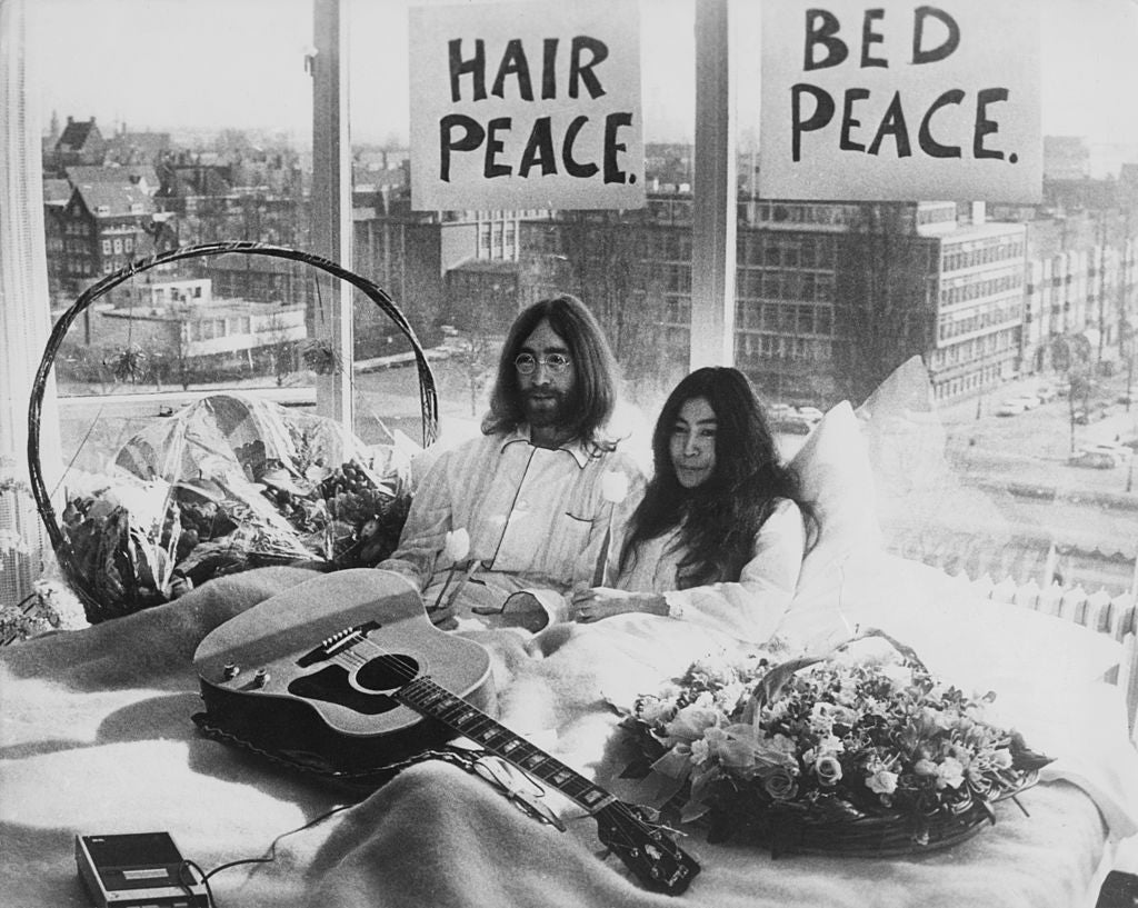 John Lennon and his wife of a week, Yoko Ono, in their bed in the Hilton Hotel, Amsterdam, in 1969