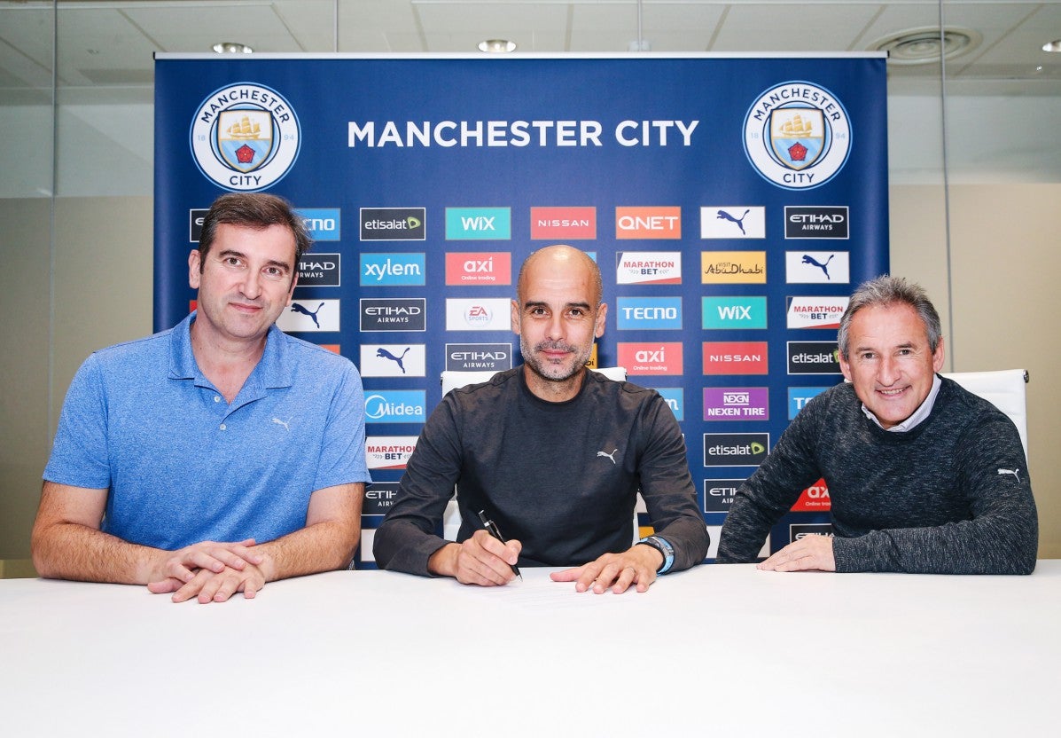 Txiki Begiristain, right, helped lure Pep Guardiola to Manchester City