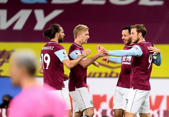 <p>Burnley celebrate the goal of Chris Wood</p>