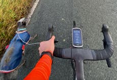 Olympic cyclist rescues dog using headphones for lead while on ride