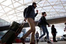 Millions stick with Thanksgiving travel plans despite Covid warnings
