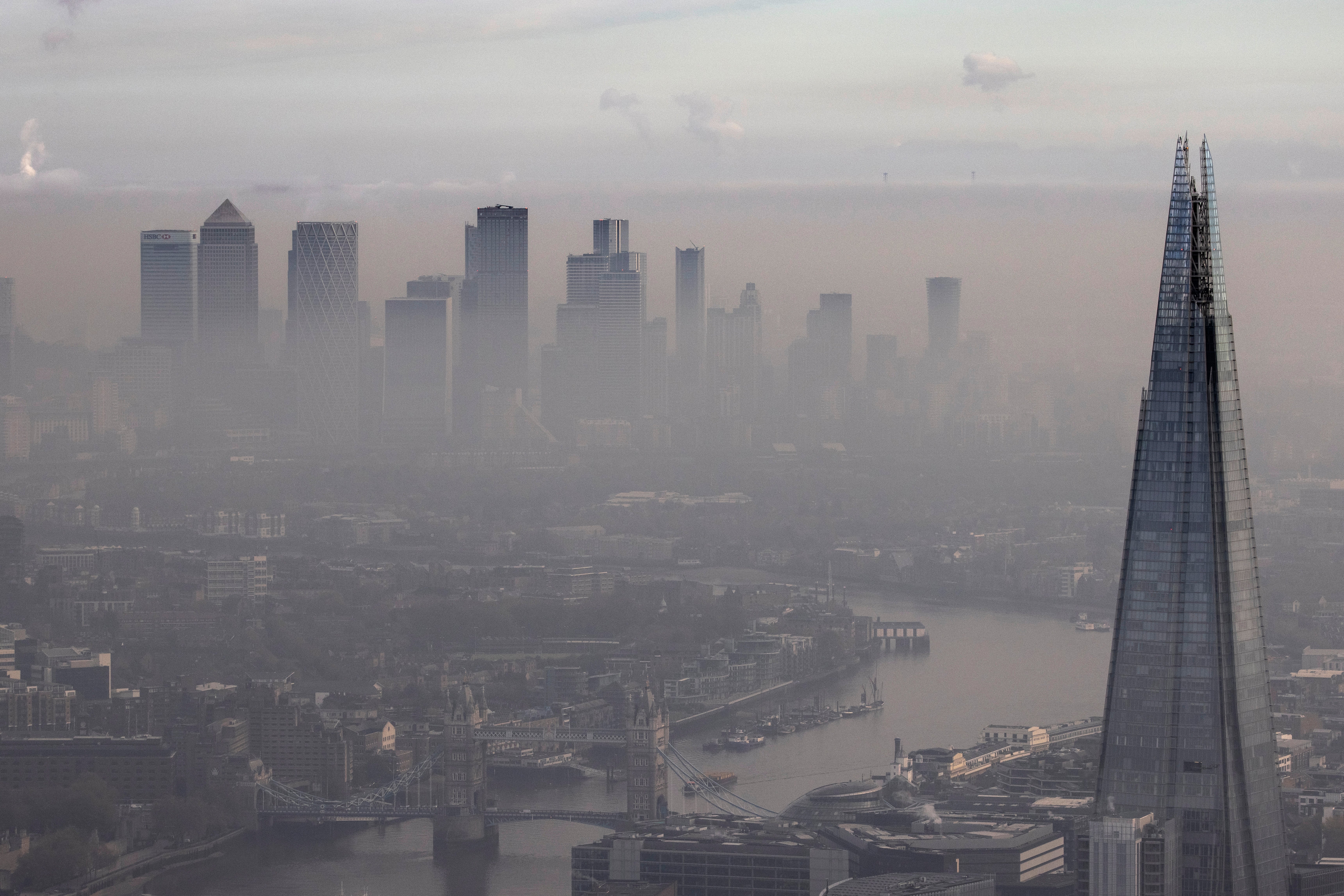 Fog shrouds the Shard and the view towards the Canary Wharf in London