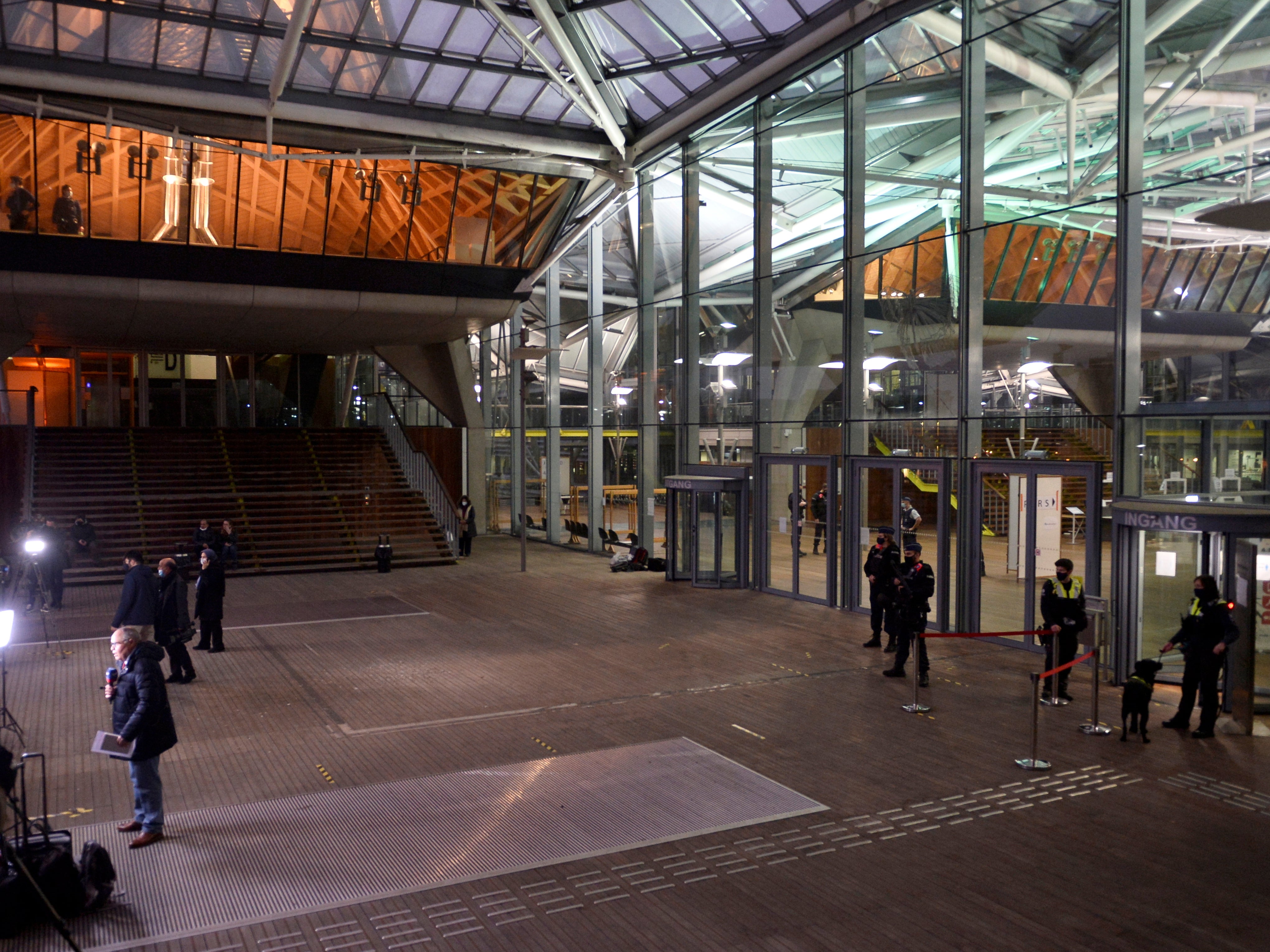 Police officers stand guard before a trial of Iranian diplomat Assadollah Assadi, charged in Belgium with planning to bomb a meeting of an exiled Iranian opposition group in France