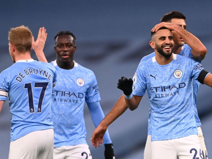 Riyad Mahrez celebrates with Rodrigo, Benjamin Mendy and Kevin De Bruyne