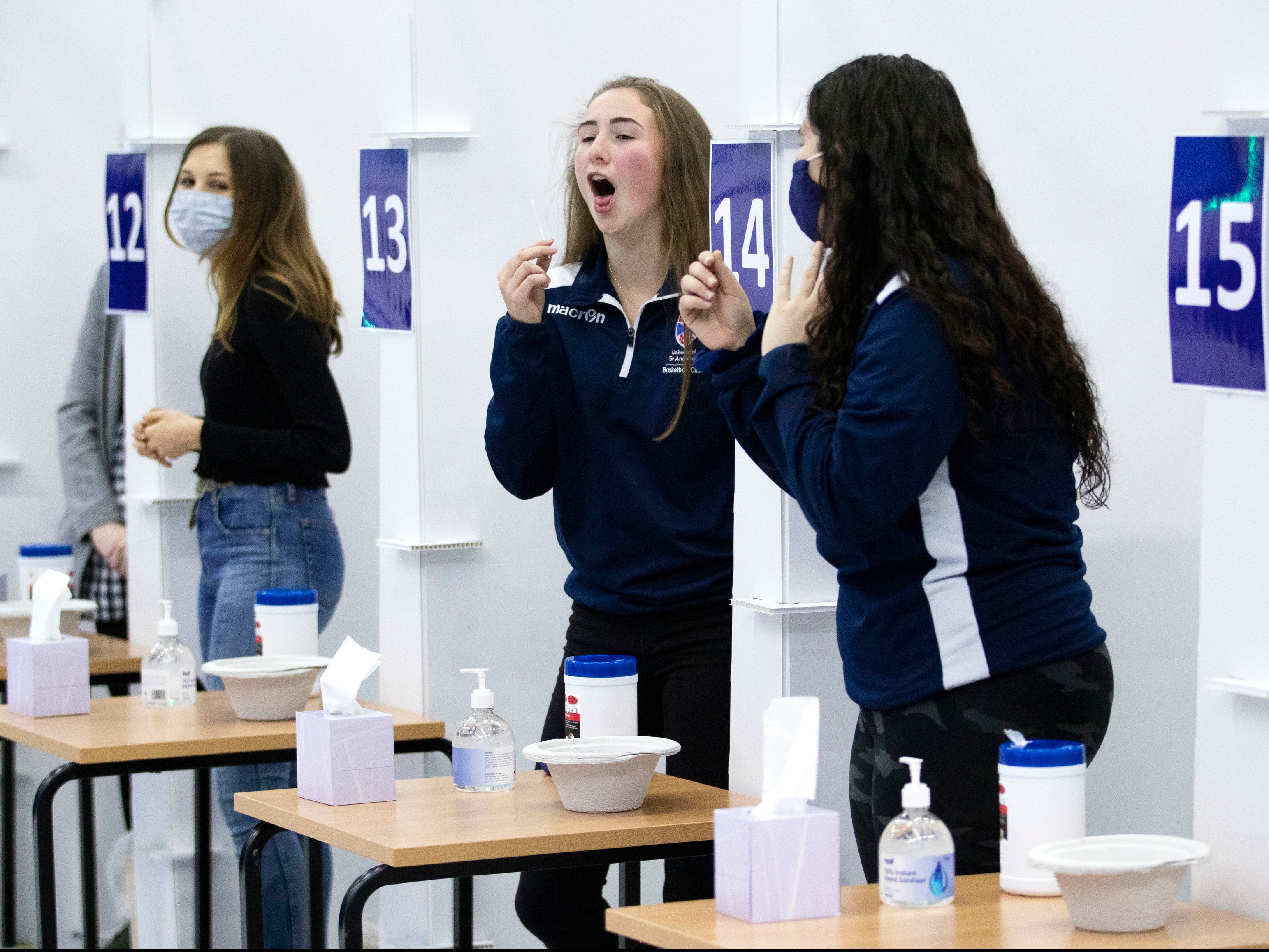 Students get a Covid-19 test at St Andrews University in Scotland ahead of the Christmas holiday