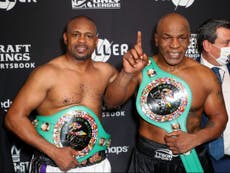 Tyson and Jones fight to draw in battle of boxing legends