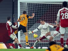 Wolves recover after Jimenez head injury to defeat Arsenal